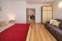 Posteľ alebo postele v izbe v ubytovaní Apartment Vrbnik 21