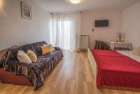 Posteľ alebo postele v izbe v ubytovaní Apartment Vrbnik 21