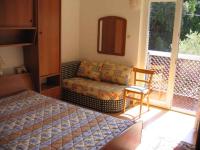 Postel nebo postele na pokoji v ubytování Apartment Supetarska Draga 26