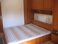 Postel nebo postele na pokoji v ubytování Apartment Supetarska Draga 26