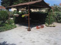 Vonkajšia záhrada v ubytovaní Apartment in Zadar/Zadar Riviera 7970