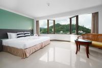 I Pavilion Hotel Phuketにあるベッド