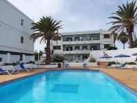 Bazén v ubytovaní COSTA LUZ Relax Suite alebo v jeho blízkosti