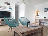 Televízia a/alebo spoločenská miestnosť v ubytovaní COSTA LUZ Relax Suite