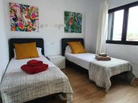 Posteľ alebo postele v izbe v ubytovaní COSTA LUZ Relax Suite