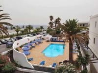 Bazén v ubytovaní COSTA LUZ Relax Suite alebo v jeho blízkosti