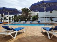 Bazén v ubytovaní COSTA LUZ Relax Suite alebo v jeho blízkosti