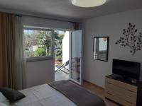 Posteľ alebo postele v izbe v ubytovaní Apartments Summer Bloom