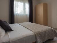 Posteľ alebo postele v izbe v ubytovaní Apartments Summer Bloom