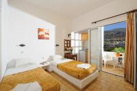 Postel nebo postele na pokoji v ubytování Stelios Residence Apartments