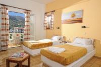 Postel nebo postele na pokoji v ubytování Stelios Residence Apartments