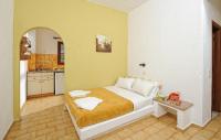 Postel nebo postele na pokoji v ubytování Stelios Residence Apartments