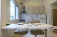 A kitchen or kitchenette at Just For Two