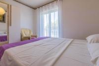 Posteľ alebo postele v izbe v ubytovaní Apartment in Jadranovo 14267