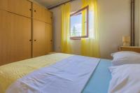 Posteľ alebo postele v izbe v ubytovaní Apartment in Jadranovo 14267