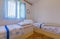 Posteľ alebo postele v izbe v ubytovaní Apartment in Jadranovo 14267