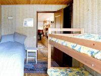 Postel nebo postele na pokoji v ubytování 4 person holiday home in LYSEKIL-By Traum