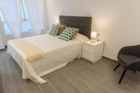 Postel nebo postele na pokoji v ubytování Apartamentos Constitución by Renthas