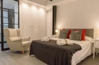 Postel nebo postele na pokoji v ubytování Apartamentos Constitución by Renthas