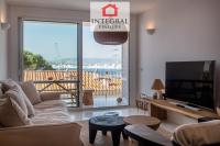 A television and/or entertainment centre at Palamós Moonlight Apartment
