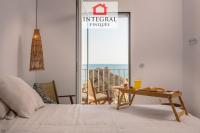 A bed or beds in a room at Palamós Moonlight Apartment