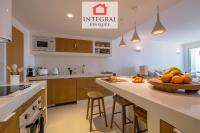 A kitchen or kitchenette at Palamós Moonlight Apartment