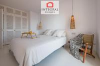 A bed or beds in a room at Palamós Moonlight Apartment