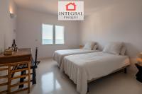 A bed or beds in a room at Palamós Moonlight Apartment