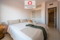 A bed or beds in a room at Palamós Moonlight Apartment