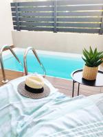 The swimming pool at or close to Aelia Seaside Luxury Suites
