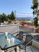 A balcony or terrace at Aelia Seaside Luxury Suites