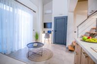 A kitchen or kitchenette at Aelia Seaside Luxury Suites