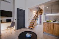 A kitchen or kitchenette at Aelia Seaside Luxury Suites