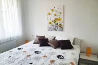 Posteľ alebo postele v izbe v ubytovaní No.5 Apartment