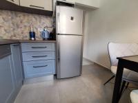 Kuchyňa alebo kuchynka v ubytovaní Apartment Sara