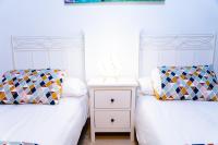 A bed or beds in a room at Apartamentos Las Secuoyas
