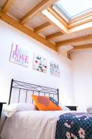 A bed or beds in a room at Apartamentos Las Secuoyas