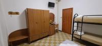 Łóżko lub łóżka w pokoju w obiekcie Hotel Astoria
