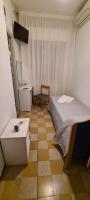 Łóżko lub łóżka w pokoju w obiekcie Hotel Astoria