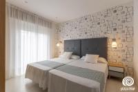 Postel nebo postele na pokoji v ubytování Apartamentos Turísticos Playa Mar I