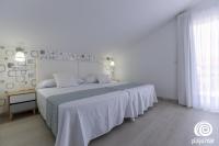 Postel nebo postele na pokoji v ubytování Apartamentos Turísticos Playa Mar I