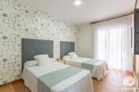 Postel nebo postele na pokoji v ubytování Apartamentos Turísticos Playa Mar I