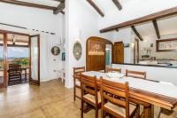 A kitchen or kitchenette at Villa vista Mare Santa Teresa