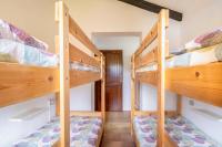 A bed or beds in a room at Villa vista Mare Santa Teresa