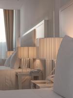 Postel nebo postele na pokoji v ubytování Burgus Tribute & Design Hotel