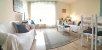 Łóżko lub łóżka w pokoju w obiekcie Azúr Apartman Keszthely