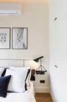 A bed or beds in a room at BILBAO URBAN by STAYNN APARTMENTS