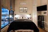 A bed or beds in a room at BILBAO URBAN by STAYNN APARTMENTS