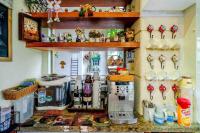 a toy kitchen with a coffee maker on a shelf at 花蓮 達芙妮花園民宿 in Ji&#39;an