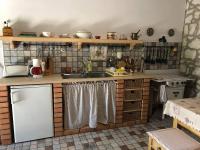 Kuchnia lub aneks kuchenny w obiekcie Szőlőskert Vendégház, Erdőbénye